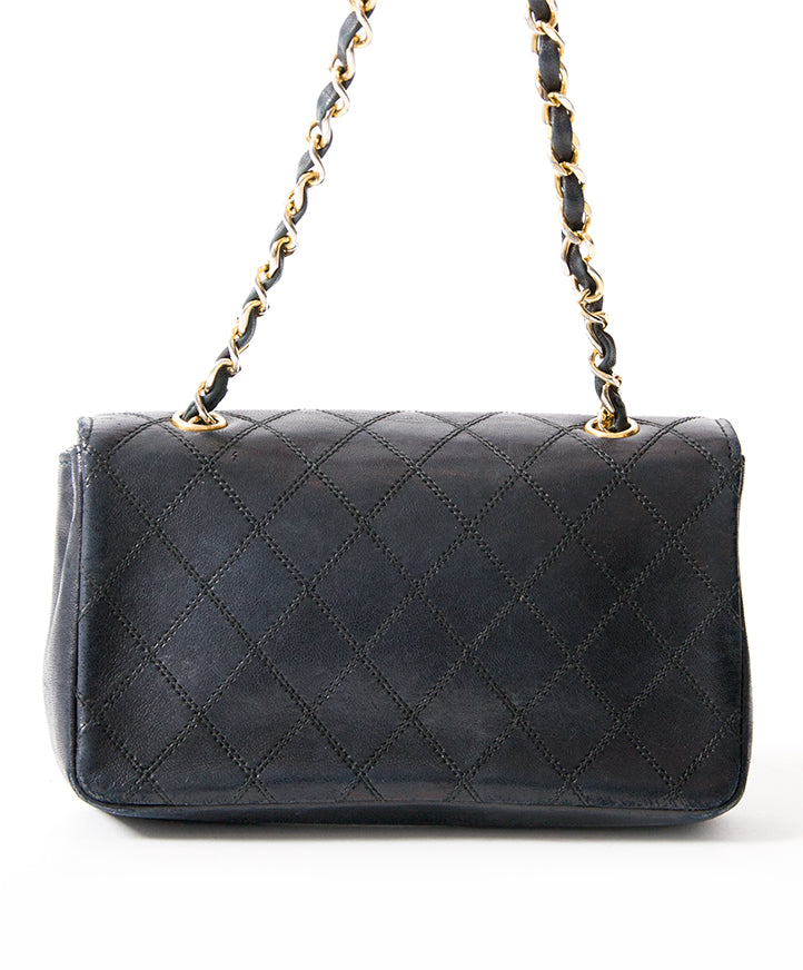 Chanel Vintage Small Quilted Black Flap Bag authentic secondhand safe online shopping webshop fashion style LabelLOV Antwerp Belgium high end luxury labels brand designer