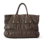 Prada Brown Gaufre Bag, Prada bags are well- known and well- loved for their signature Jacquard lining. Visit Labellov for more luxury preloved bags