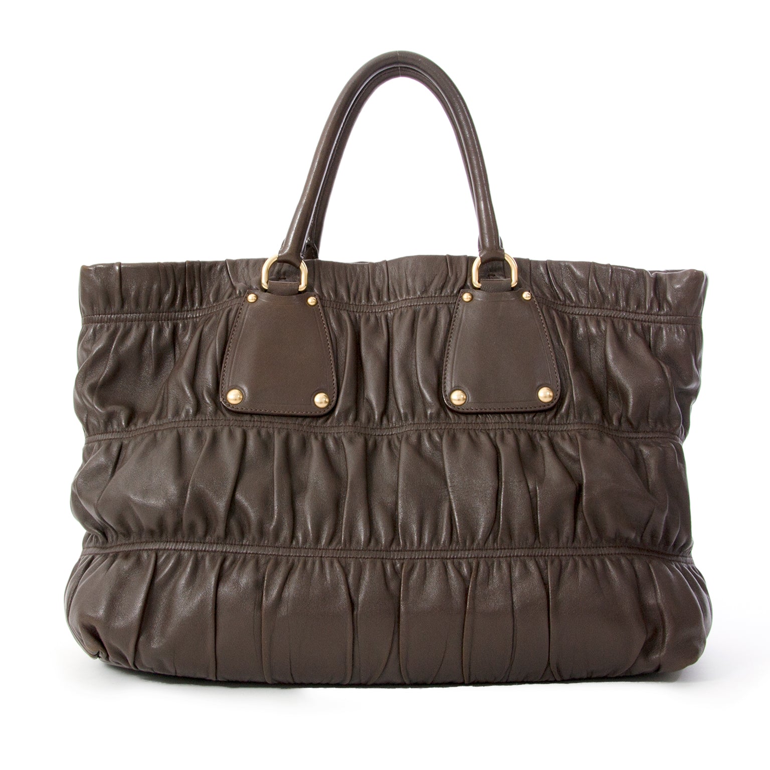 Prada Brown Gaufre Bag, Prada bags are well- known and well- loved for their signature Jacquard lining. Visit Labellov for more luxury preloved bags