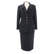 Authentieke tweedehands Chanel zwarte blazer en lange rok tailleur
