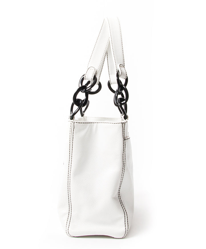 Cute Chanel tote with black epoxy double 'C' logo and shoulder straps. This bag is made from white caviar leather - the wellknown pebbled calfskin - has contrast stitchings and gold matte gold-tone hardware.