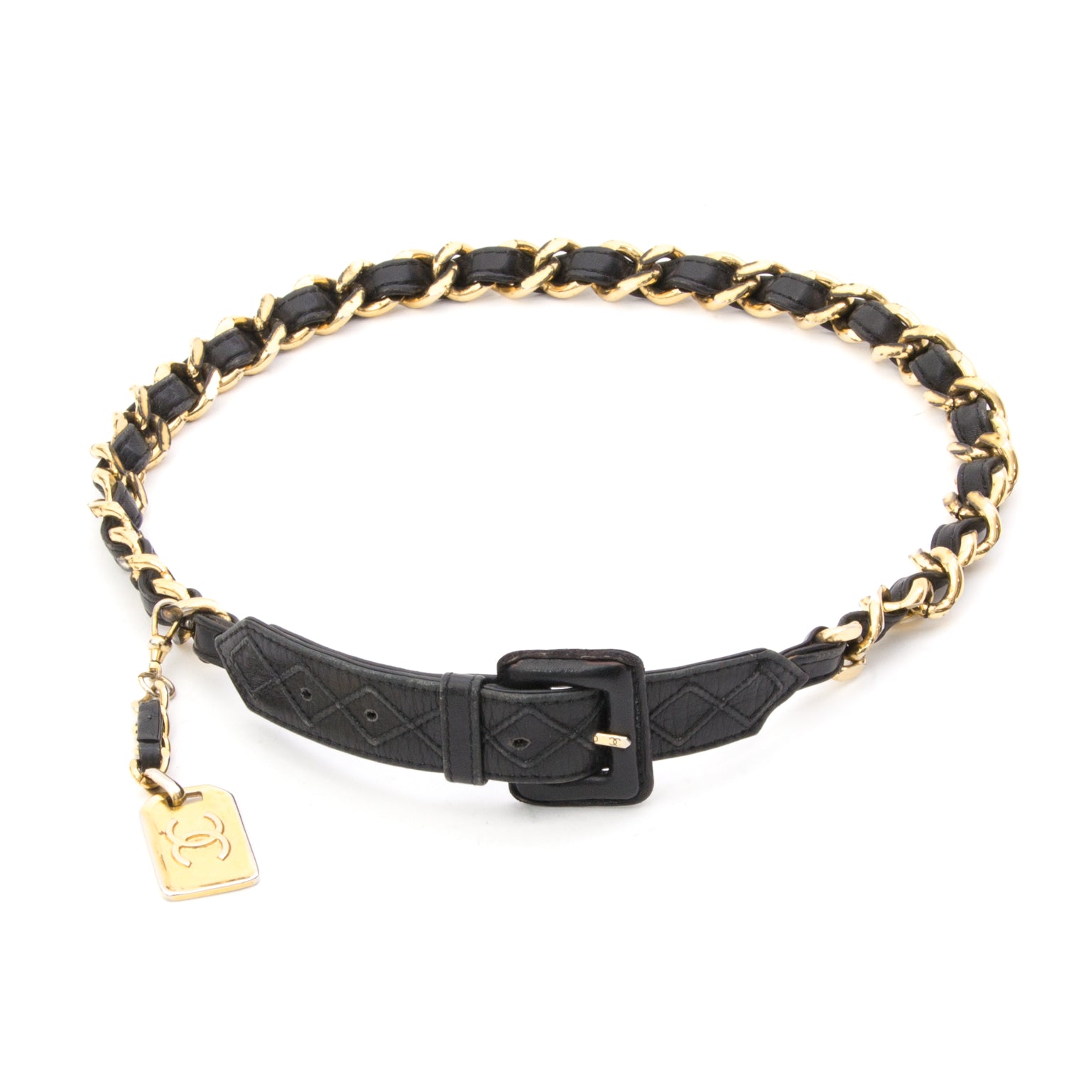 Classic style Chanel belt. Black lambskin and gold-tone chain with signature Chanel Tag as pendant.