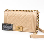 designer vintage chanel boy pearl beige medium net als nieuw aan de beste prijs 100% authentiek tweedehands
