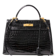 acheter en ligne seconde main Hermes Kelly black in shiny Pororsus corodile leather, like new 100% authentic