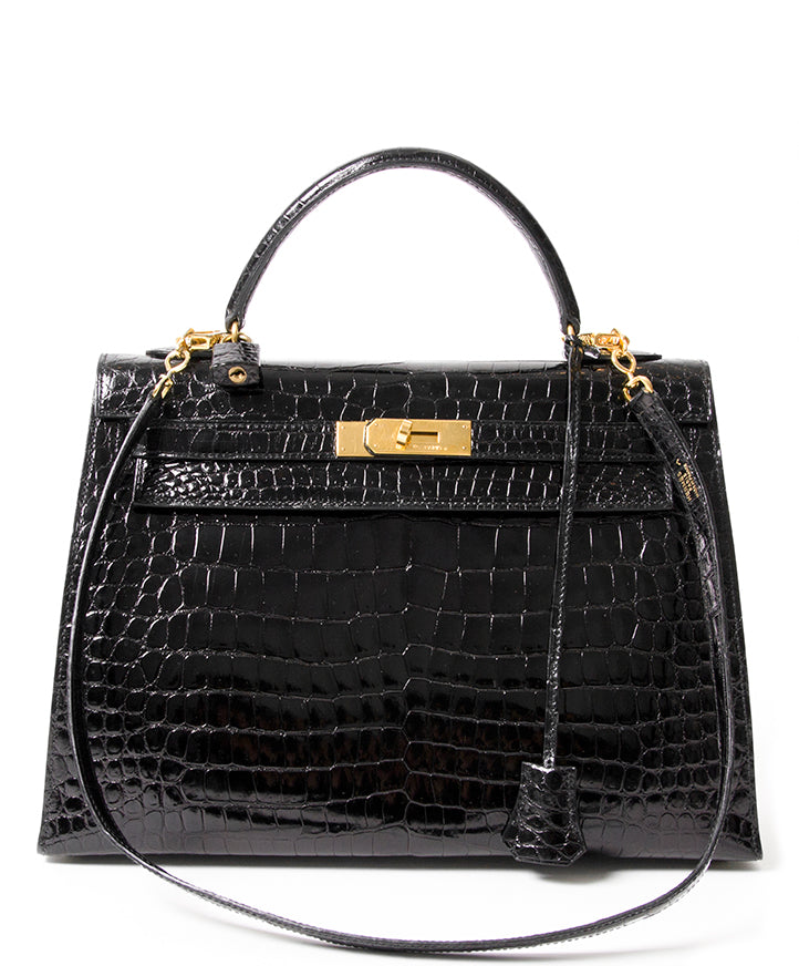 acheter en ligne seconde main Hermes Kelly black in shiny Pororsus corodile leather, like new 100% authentic