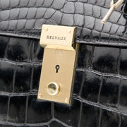 Delvaux Croco briefcase Slekely 1992. For more vintage preloved or new luxury handbags, visit Labellov. The online platform offers a wide selection of authentic designer brands for the right price.