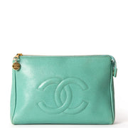 Seafoam green puch by Chanel with CC embossed pebbled leather upper for the best price at Labellov Antwerp online store