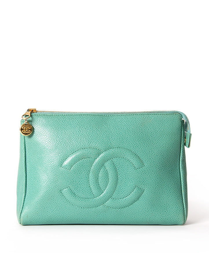 Seafoam green puch by Chanel with CC embossed pebbled leather upper for the best price at Labellov Antwerp online store