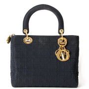 Lady Dior handbag in Navy Fabric Small Size with golden hardware. Buy at the right price on Labellov.com
