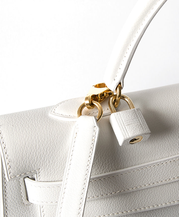 Authentic Hermès Kelly Bag GHW Shoulder Strap buy secondhand authentic designer luxury bags high-end labels online safe shopping webshop Antwerp Belgium LabelLOV fashion style