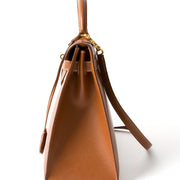 koop veilig en snel online tweedehands Hermes Kelly 32 goud net als nieuw beste prijs 100% echt