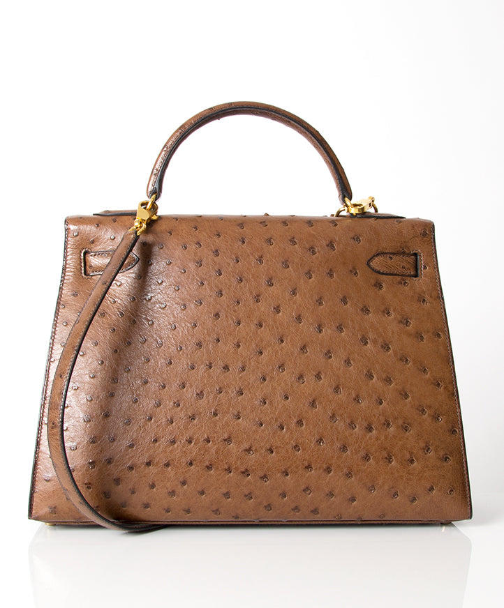Authentic Hermès Kelly Bag Ostrich GHW With Strap. Safe and secure online shopping. Koop authentieke tweedehands Hermès Constance bij LabelLOV webwinkel.