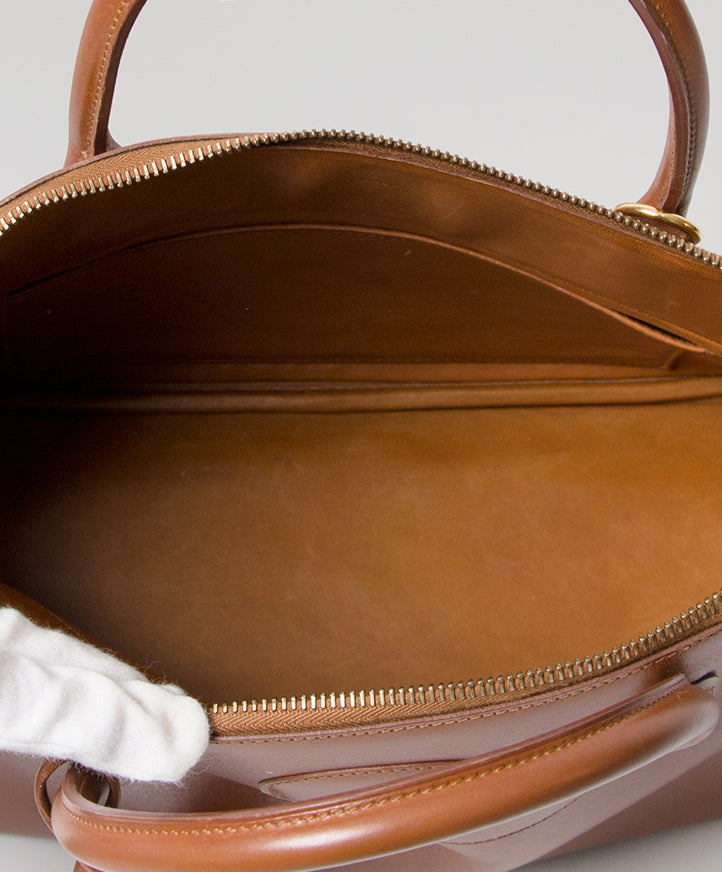 Hermès Bolide 32 Cognac Box Calf Tote Bag. handtas juiste prijs GHW goud clochette cadena schouderriem veilig online winkelen labellov designer vintage luxe merken mode Antwerpen België