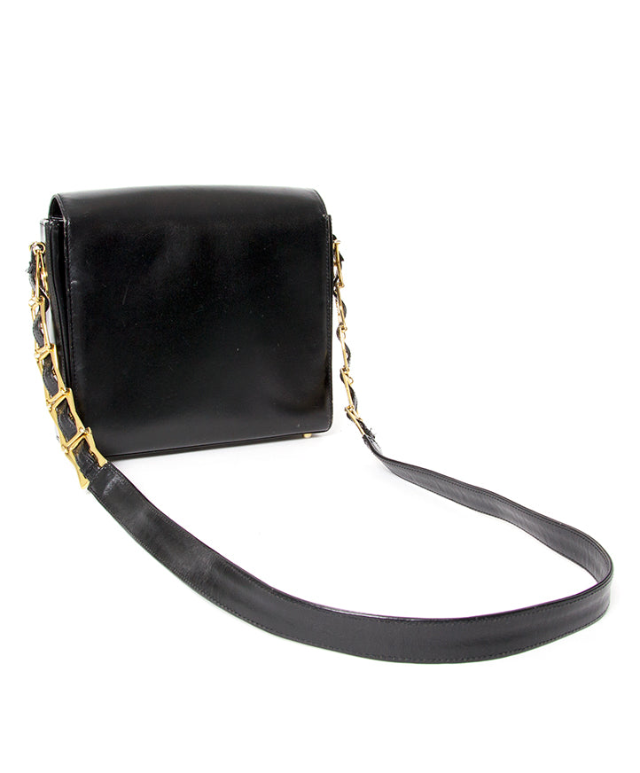 Black leather medusa logo vintage luxe Gianni Versace
