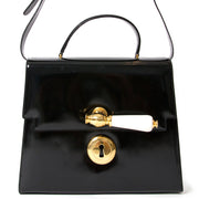 Koop veilig online tweedehands moschino doorknob patent black handbag aan de beste prijs online webshop labellov
