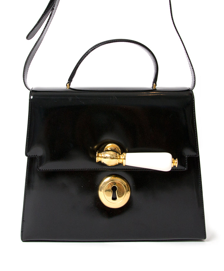 Koop veilig online tweedehands moschino doorknob patent black handbag aan de beste prijs online webshop labellov