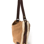 Cute shearling shoulder bag by Ugg. In their signature suede and wool edition.