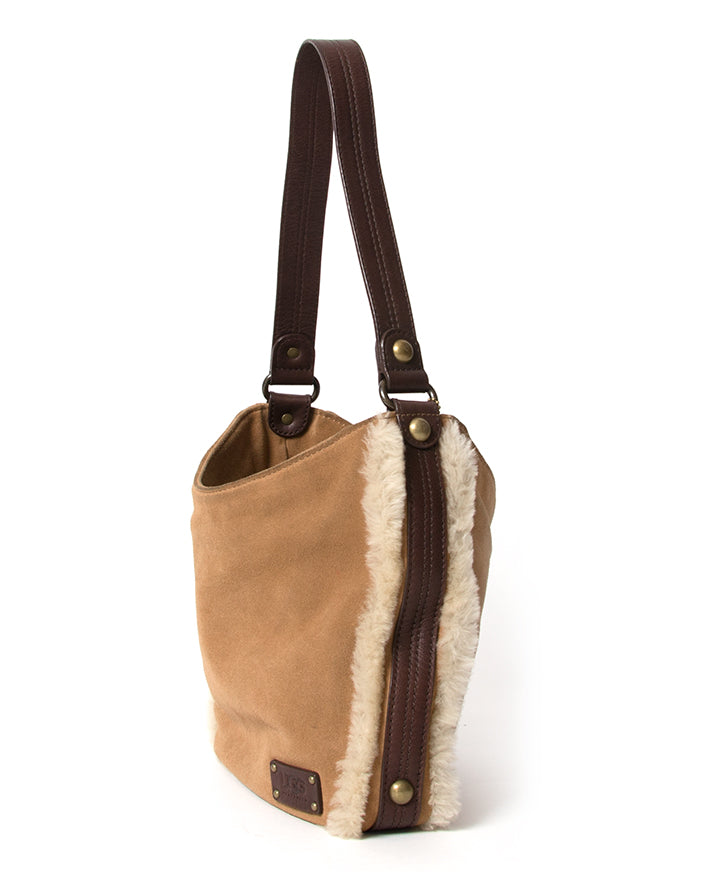 Cute shearling shoulder bag by Ugg. In their signature suede and wool edition.