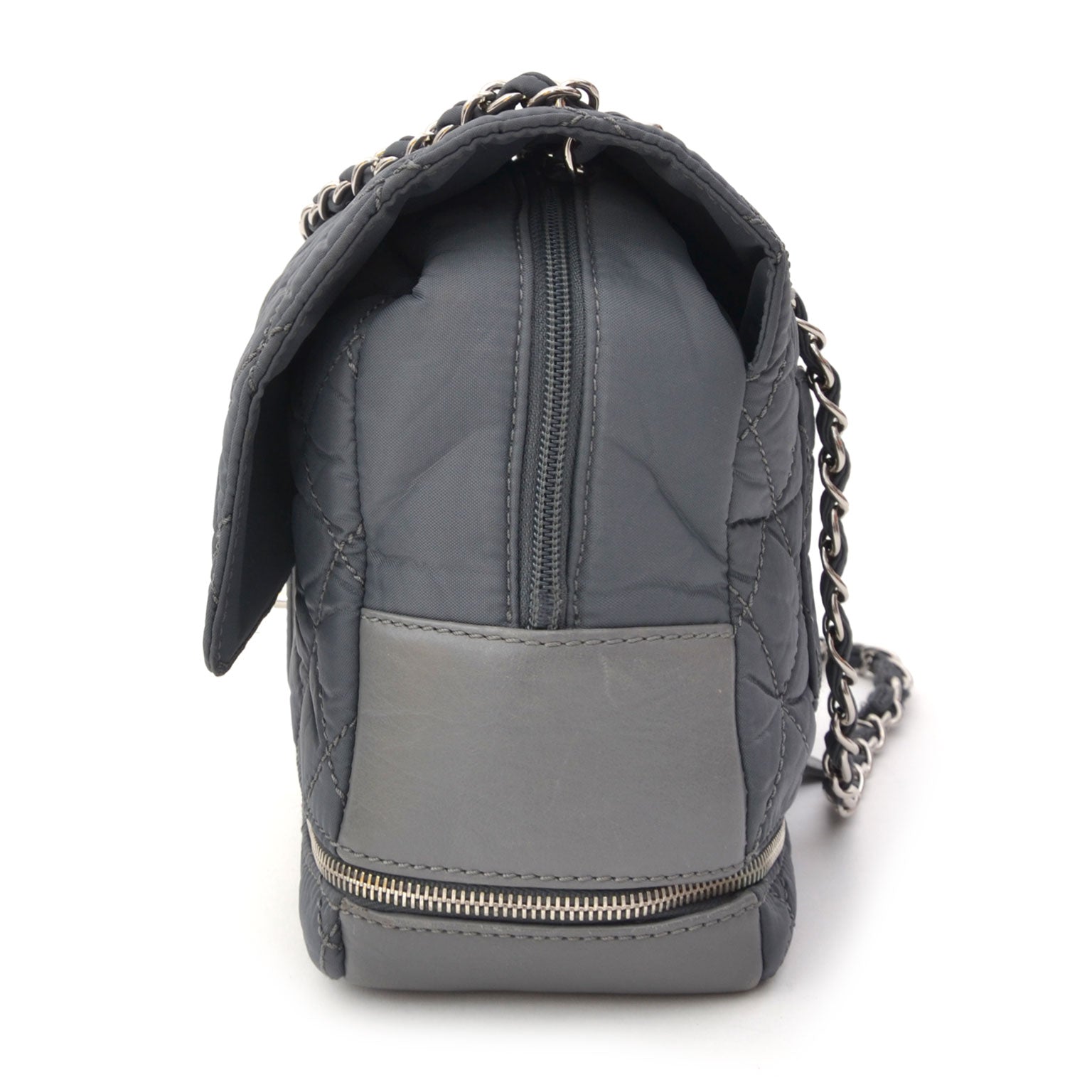 Chanel Nylon Zipper Quilted Flap Bag Grey. Shop vintage luxury designer handbags at the right price at LabelLOV