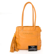 Chanel Tassel Handbag Orange. Veilig online winkelen bij LabelLOV vintage webshop.