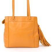 Chanel Tassel Handbag Orange. Vintage designer handbags luxury Antwerp.