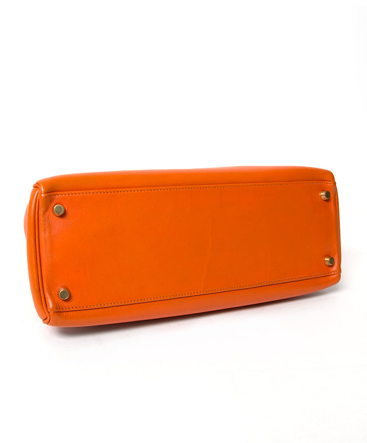2de hands luxe merk Hermes Kelly in oranje 32 aan de beste prijs 100% echt authentiek net als nieuw Antwerpen
