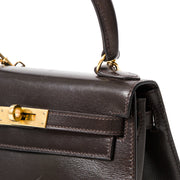 Hermès Kelly Mini Boxcalf Brown GHW With Strap Buy authentic secondhand Hermès bags at the right price at LabelLOV vintage webshop. Safe and secure online shopping. Koop authentieke tweedehands Hermès tassen met juiste prijs bij LabelLOV.