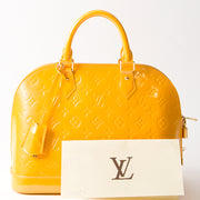 Louis Vuitton Alma Vernis Jaune Passion PM LabelLOV Antwerp Belgium online safe shopping webshop labels brands designers luxury fashion right price authentic secondhand