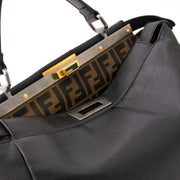 skip the waitinglist get your hands on this secondhand Fendi Black Monogram-Lined Peekaboo Bag