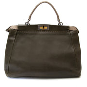 Buy vintage Fendi Khaki Peekaboo Satchel with strap at the right price at LabelLOV vintage webshop. Luxe, vintage, fashion. Safe and secure online shopping. Antwerp, Belgium.