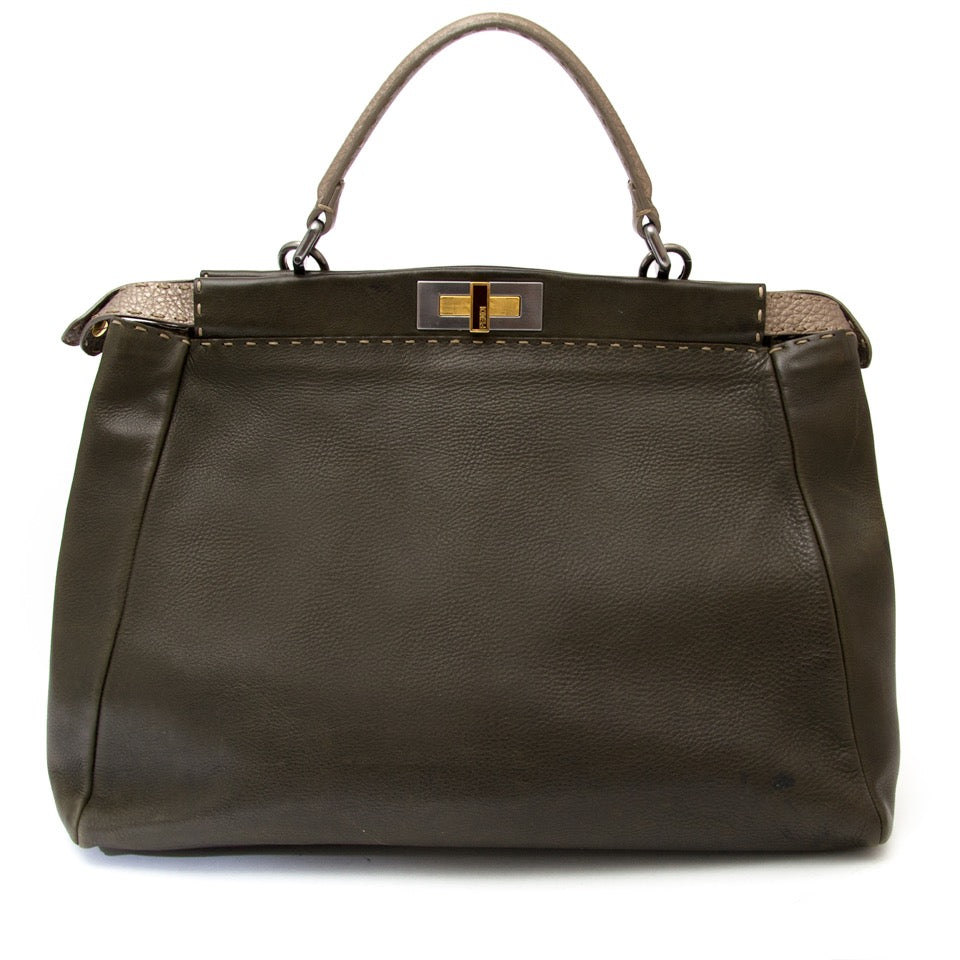 Buy vintage Fendi Khaki Peekaboo Satchel with strap at the right price at LabelLOV vintage webshop. Luxe, vintage, fashion. Safe and secure online shopping. Antwerp, Belgium.