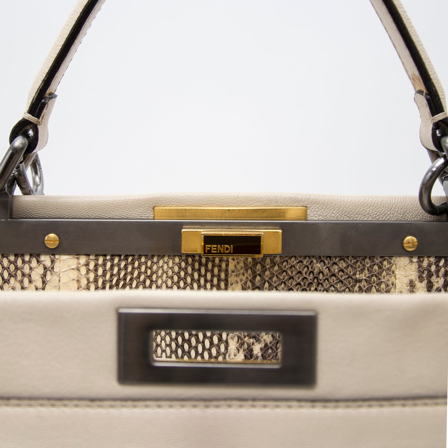 Looking for a designer bag? We buy and sell your Fendi Ombre Cream White Peekaboo
