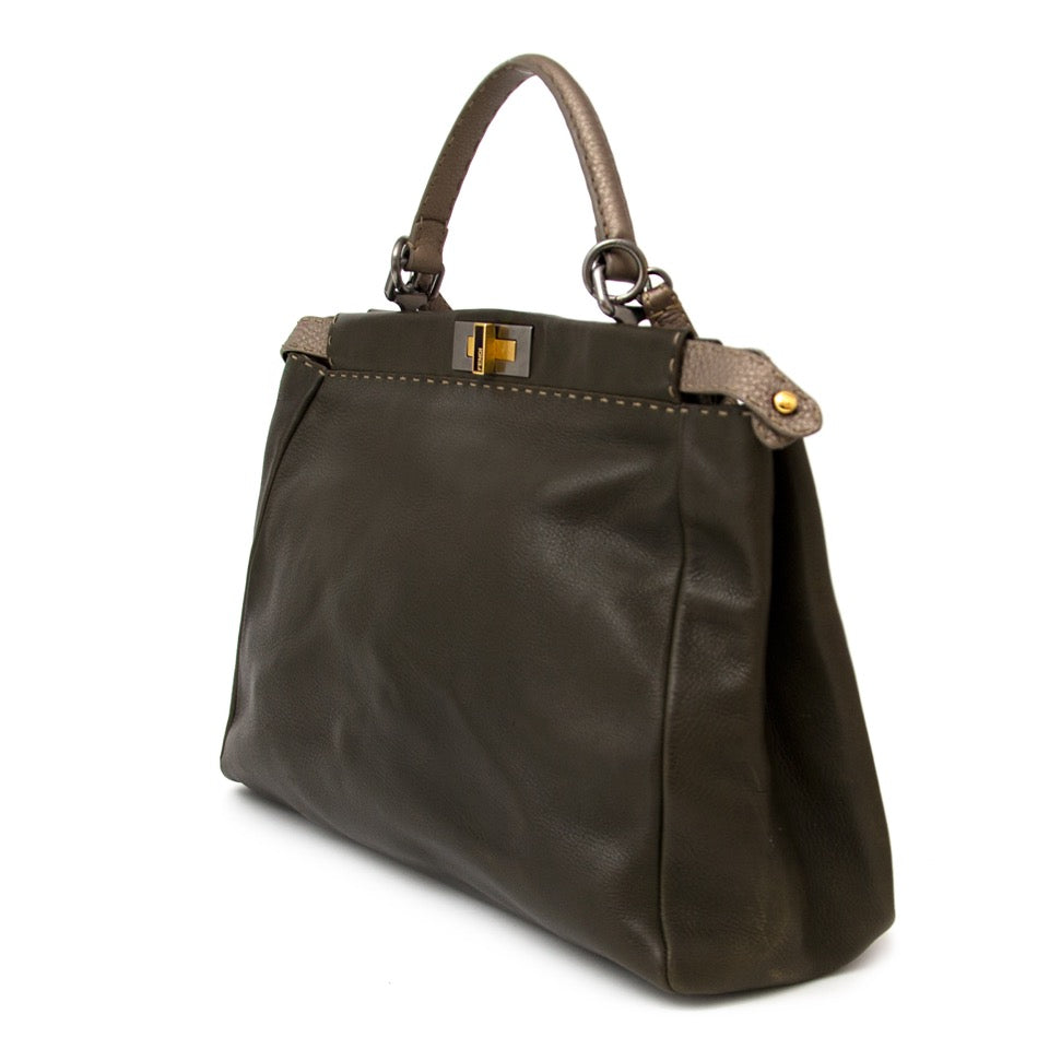 Buy vintage Fendi Khaki Peekaboo Satchel with strap at the right price at LabelLOV vintage webshop. Luxe, vintage, fashion. Safe and secure online shopping. Antwerp, Belgium.