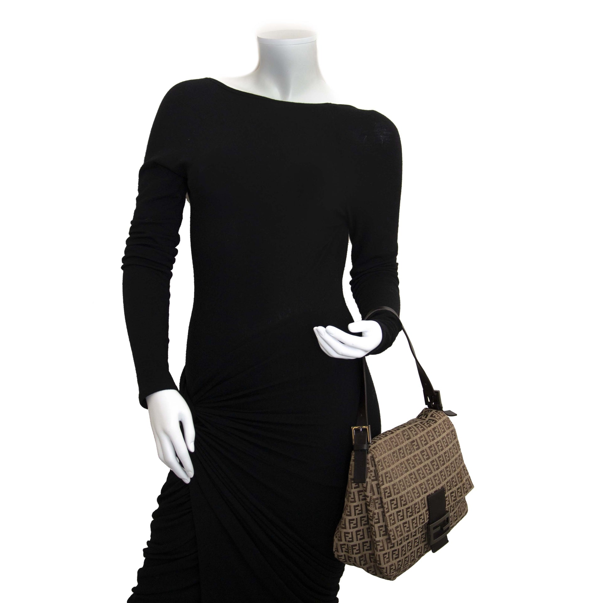 We buy and sell your 100% authentic Fendi Zucca Mama Baguette