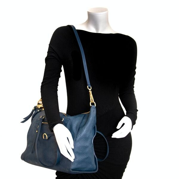 Acheter en ligne seconde main Louis Vuitton Infini Empreinte Lumineuse bag.