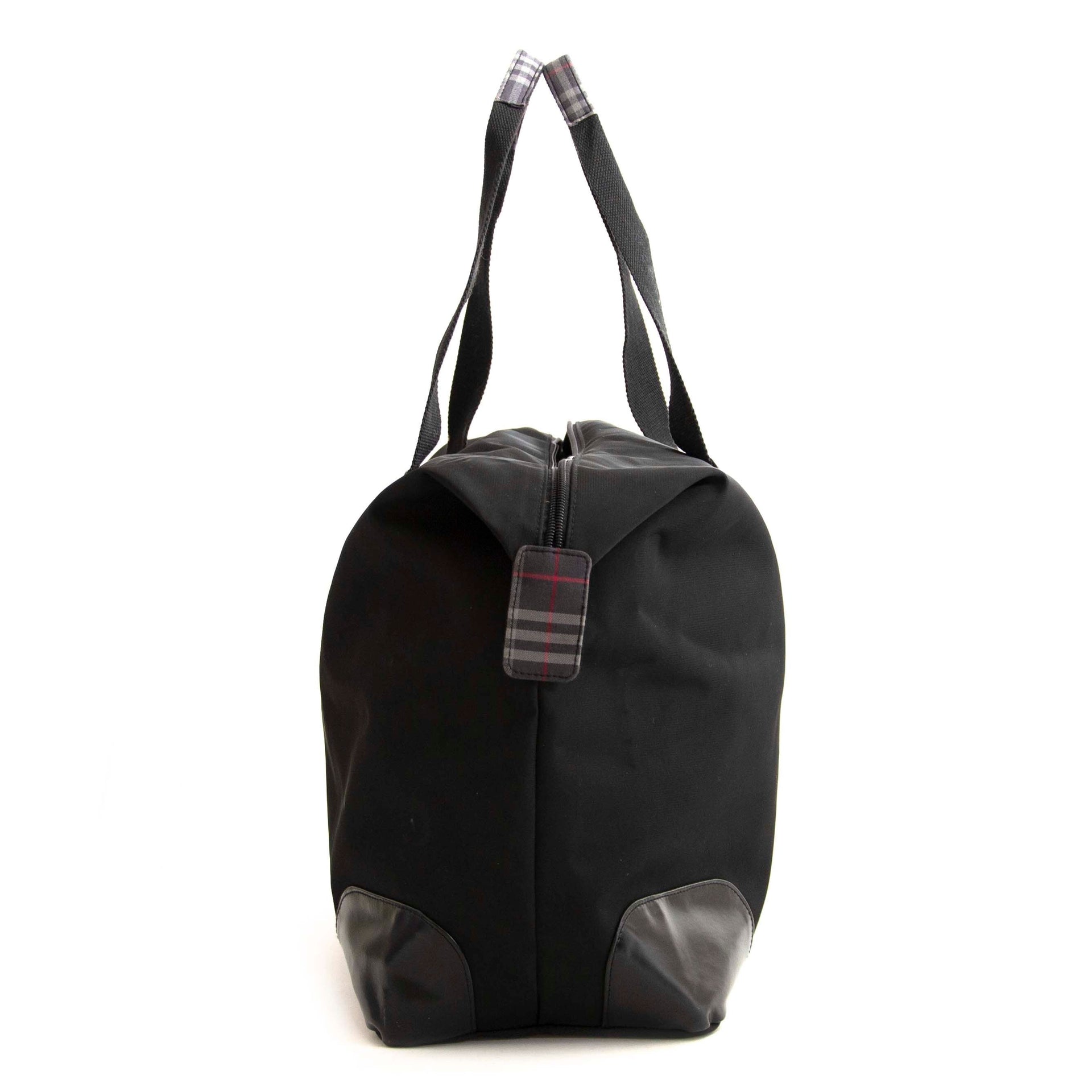 Koop veilig online tegen de beste prijs Burberry black Large Tote Travel Bag.