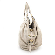 Shop online and safe at Labellov, secondhand luxury bags such as Louis Vuitton XL Hobo Mahina Leather.
