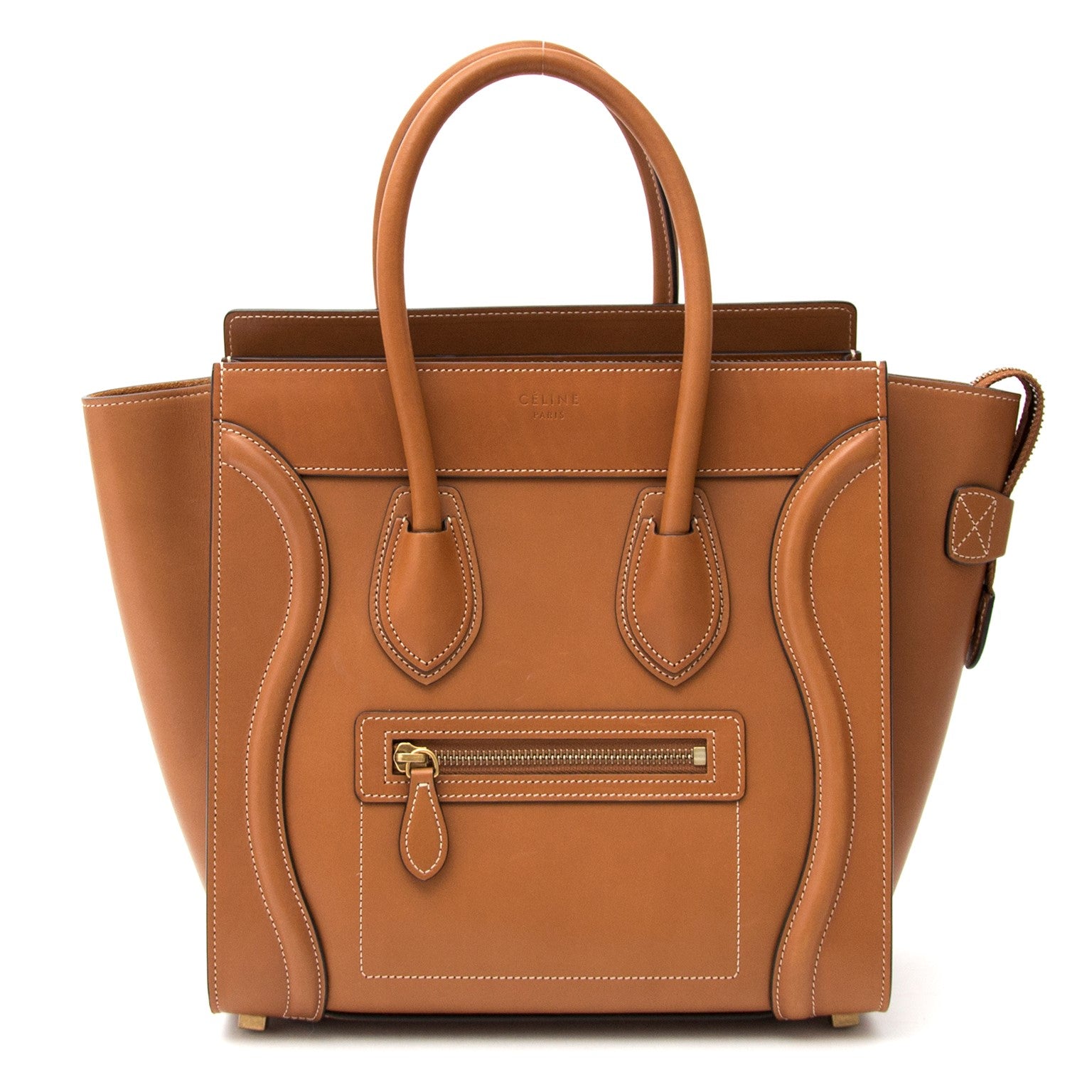 Vintage Céline cognac micro luggage handbag for the best price at Labellov webshop. Safe and secure online shopping with 100% authenticity. Vintage Céline cognac micro sac à bagages pour le meilleur prix.