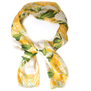 Chanel Yellow & Green Silk Scarf with White Flowers Buy authentic designer Chanel secondhand scarves at Labellov at the best price. Safe and secure shopping. Koop tweedehands authentieke Chanel sjaals bij designer webwinkel labellov.