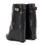 Are you interested in an authentic pair of Givenchy Black Shark Lock Boots?