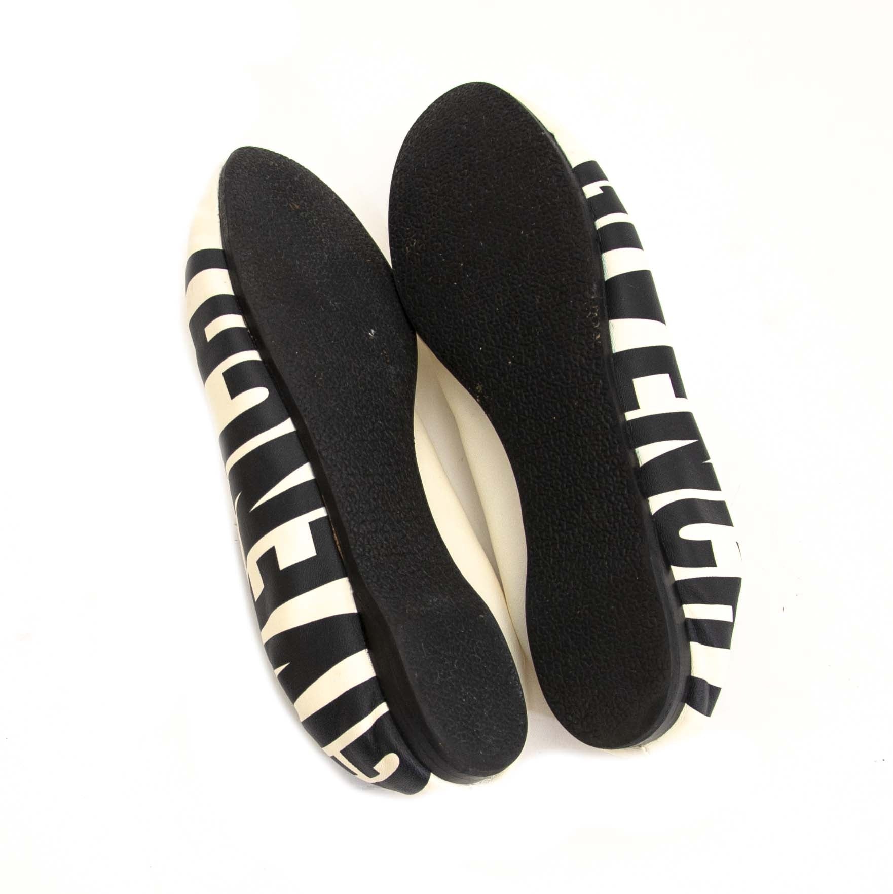 Givenchy White Printed Leather Slip-on Flats for the best price available online at Labellov