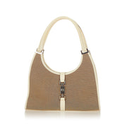 Buy online an authentic second hand Gucci Beige/White Canvas Jackie Shoulder Bag in very good condition at Labellov in Antwerp.
