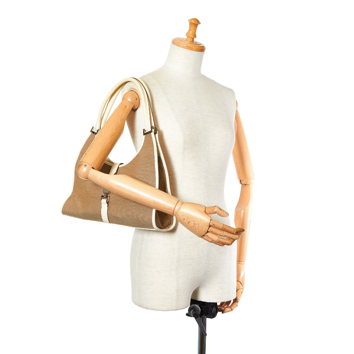 Buy online an authentic second hand Gucci Beige/White Canvas Jackie Shoulder Bag in very good condition at Labellov in Antwerp.