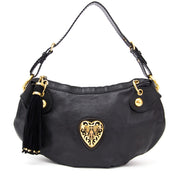 Buy Gucci Black Babushka shoulder bag with golden heart at the right price at LabelLOV vintage webshop. Luxe, vintage, fashion. Safe and secure online shopping. Antwerp, Belgium.