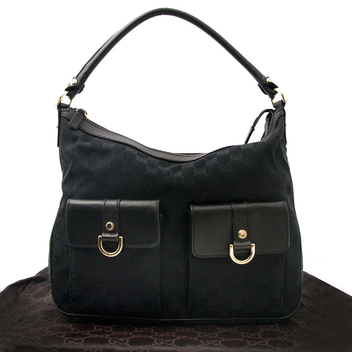 Compra une cartera Gucci autentica vintage en monogramo de cuero muy en moda para el precio correcto en LabelLOV.