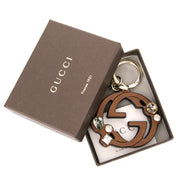 Koop nu 100% authentiek Gucci bruine logo sleutelhanger aan de beste prijs bij Labellov