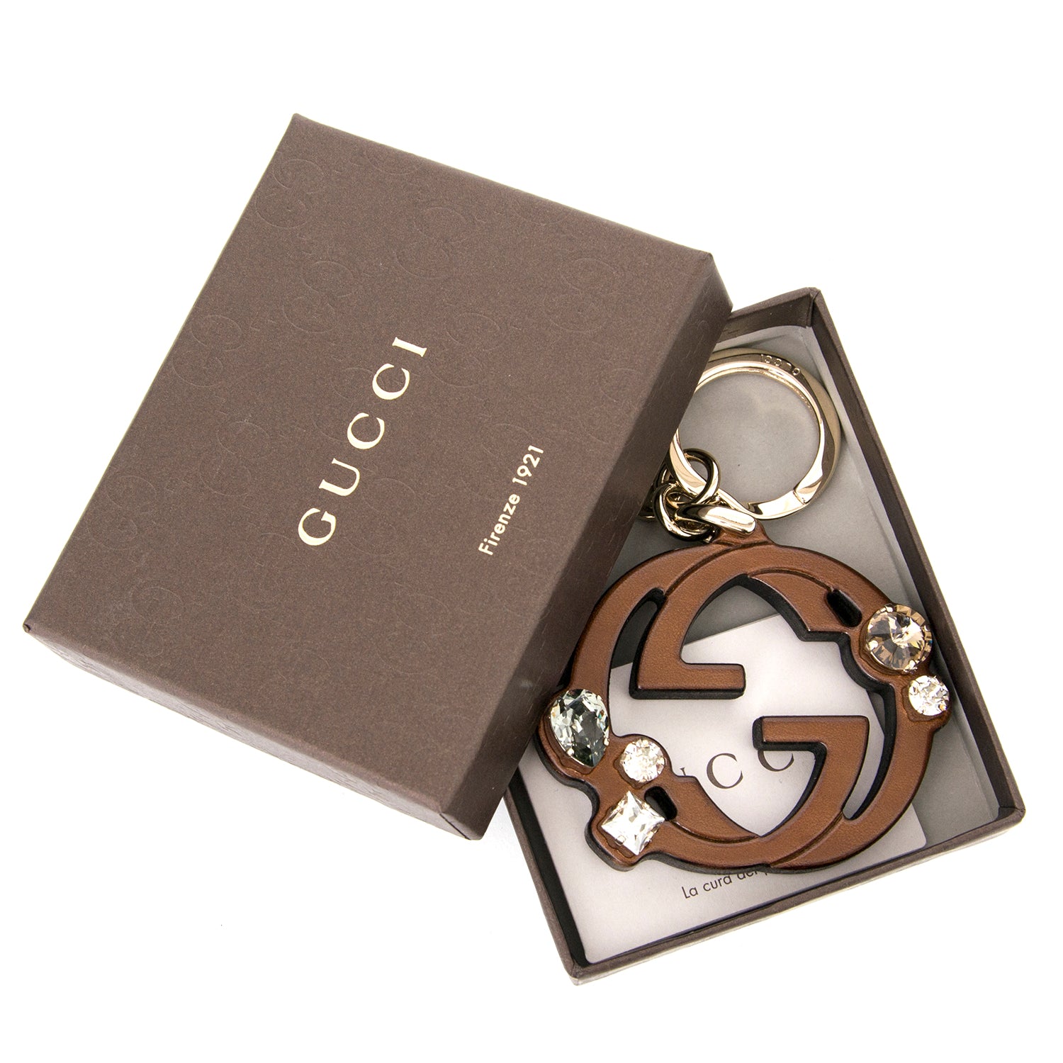 Koop nu 100% authentiek Gucci bruine logo sleutelhanger aan de beste prijs bij Labellov