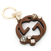 Brown keychain by Italian designer brand Gucci for the best price and with worldwide shipping