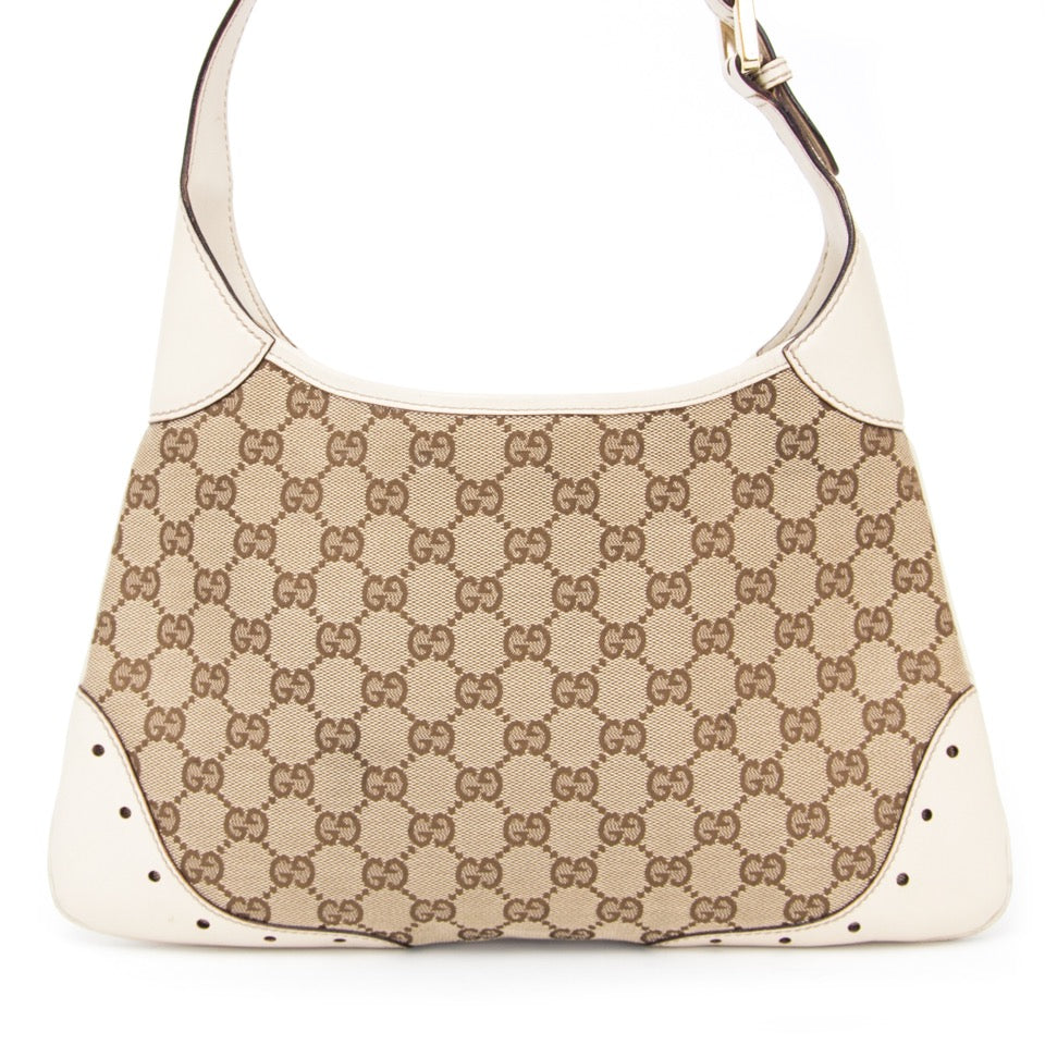 Buy Gucci Monogram Shoulder bag with white trim and gold buckle. at the right price at LabelLOV vintage webshop. Luxe, vintage, fashion. Safe and secure online shopping. Antwerp, Belgium.
