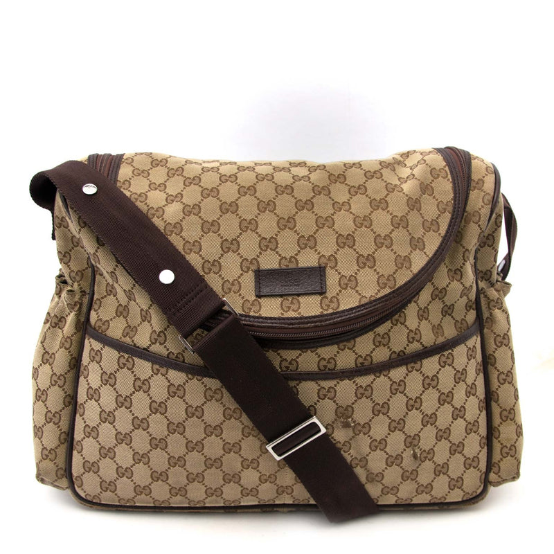 Gucci Monogram Diaper Bag Buy authentic designer Gucci secondhand bags at Labellov at the best price. Safe and secure shopping. Koop tweedehands authentieke Gucci tassen bij designer webwinkel labellov.